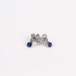A pair of 18 ct white gold, triple-diamond and sapphire stud earrings