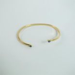 A 9 ct yellow gold and sapphire bracelet