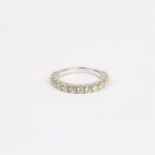 A 9 ct white gold and diamond, 3/4 eternity ring (1.03 carats total)
