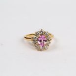 An 18 ct yellow gold, pink sapphire and diamond, cluster ring