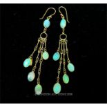 A pair of 1 ct yellow gold and opal, tassel, drop earrings