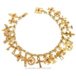 A 9 ct yellow gold, yellow gold charm bracelet with gem-set cross charms