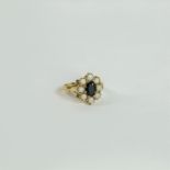 A 14 ct yellow gold, sapphire and white natural opal, cluster ring