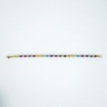 A boxed, 9 ct yellow, gold, multi-gemstone bracelet