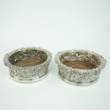 A pair of George III sterling silver wine coasters, S C Younge & Co