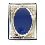 A contemporary rectangular sterling silver photograph frame