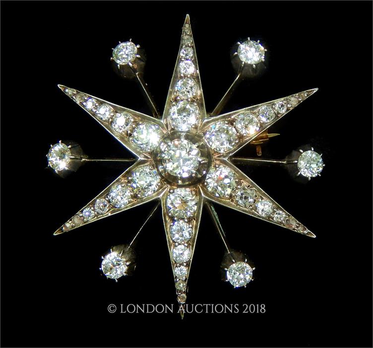 An exquisite,15 ct yellow gold, large, Victorian, diamond starburst brooch (5.45 cts)
