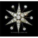 An exquisite,15 ct yellow gold, large, Victorian, diamond starburst brooch (5.45 cts)