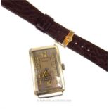 A rare, 1920's silver-metal cased, Rolex watch with a brown-leather, Rolex strap