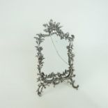 A Continental silver framed easel mirror