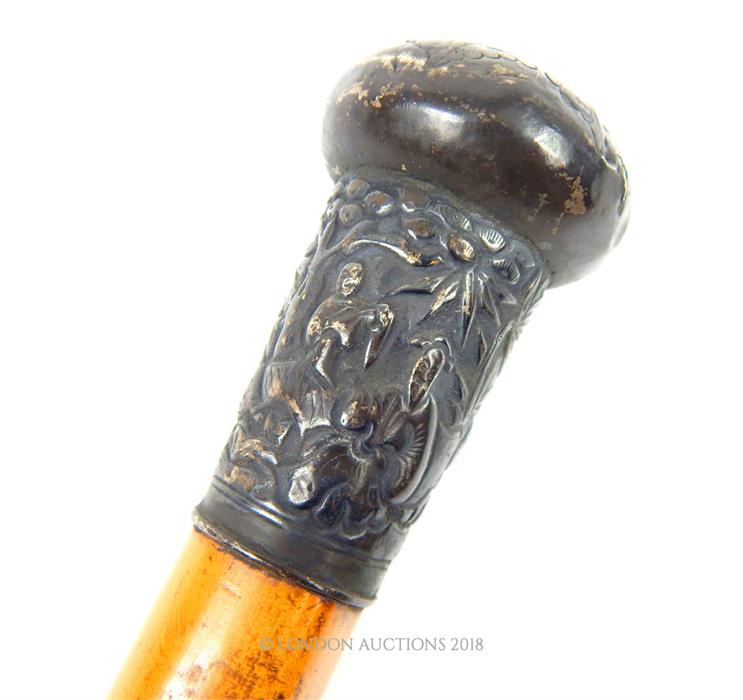 A turn of the last century Chinese mallacca wood walking stick