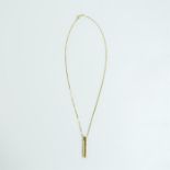 A 9 ct yellow gold and diamond pendant on 9 ct chain