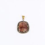 An antique, silver-gilt, natural ruby and diamond pendant