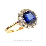 An 18 ct yellow gold, sapphire and rose-cut diamond, cluster ring