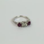 An 18 ct white gold, ruby and diamond ring