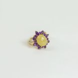 A 14 ct yellow gold, white jade and amethyst cluster ring