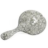 An Edwardian sterling silver hand mirror