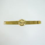 An 18 ct yellow gold, gentleman's wristwatch by The International Watch Co