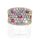 An 18 ct white gold, diamond and ruby ring