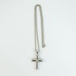 An 18 ct white gold and diamond, large Theo Fennell Cross on long chain