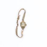 A 9 ct yellow gold, Art Deco, ladies wristwatch with 9 ct yellow gold strap