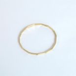 A boxed, 9 ct yellow gold bangle