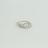 An impressive, 18 ct white gold, 3-stone, diamond ring (3.84 carats)