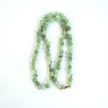 A boxed, 9 ct yellow gold, Chinese, polished, green jade, bead necklace