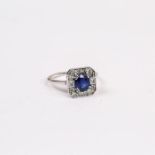 An 18 ct white gold, Art Deco style, diamond and sapphire ring