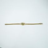 A boxed, 14 ct yellow gold, diamond and emerald bracelet