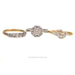 Three gold and diamond rings