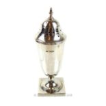 An antique, sterling silver, sugar shaker with finial top