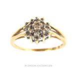 A vintage, 14 ct yellow gold and diamond cluster ring