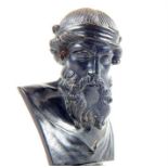 A late 19th century bronzed metal bust of a greek male, possibly a charioteer; 21cm high.
