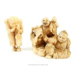 An antique carved ivory group and a netsuke