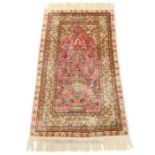 A fine quality, pure silk, Hereke rug