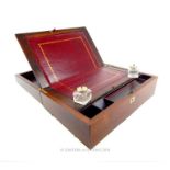 Early 19th century mahogany and rosewood writing box, brass edged, red leather gilt-tooled slope,