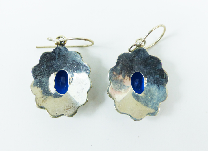 A pair of large, sterling silver and faceted blue stone earrings - Image 2 of 2