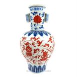 A Chinese, hand-painted, Ming-style vase