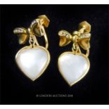 A pair of yellow gold, diamond and mother of pearl, heart-shaped earrings