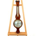 An Edwardian Sheraton revival mahogany and inlaid barometer