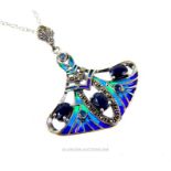 A sterling silver, Art Deco style pendant, set with sapphires, marcasite and enamel