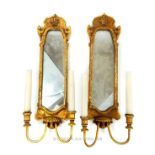 A pair of gilded Baroque style Girondole mirrors