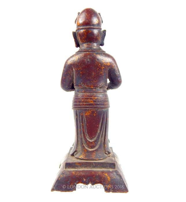 A Chinese, bronzed figure of a standing gentleman, traces of gilding - Image 3 of 3