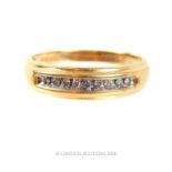 A boxed, 10 ct yellow gold and diamond-set ring