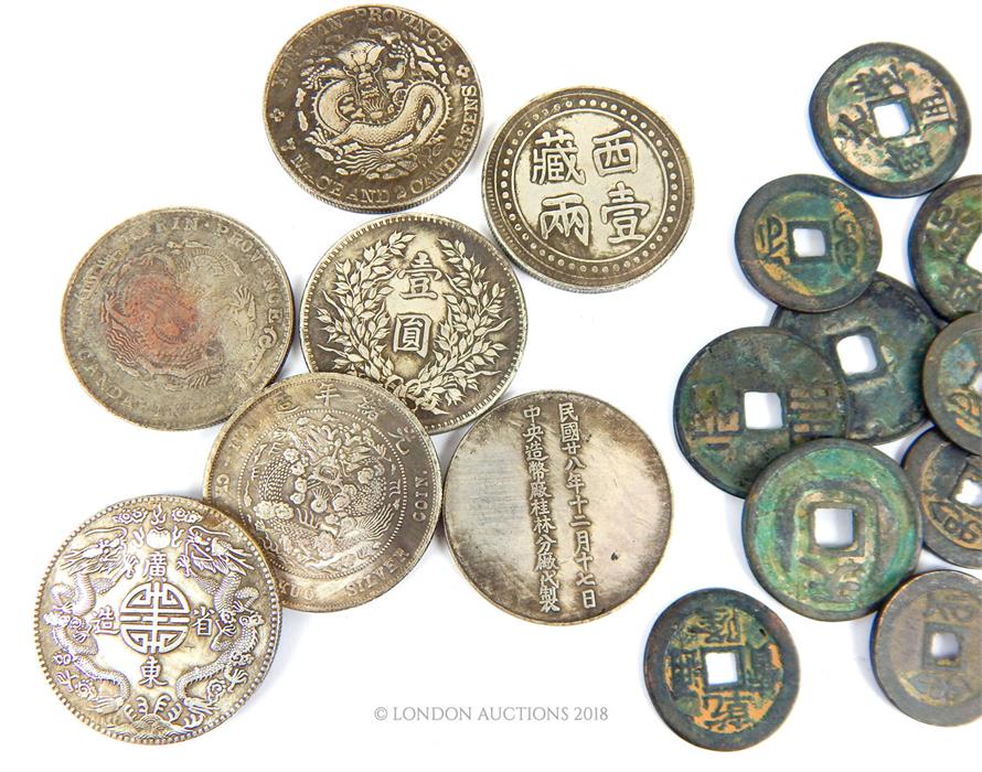 A collection of Chinese metal and white metal coins - Image 2 of 2