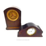 A mahogany mantel clock and an oak mantel clock