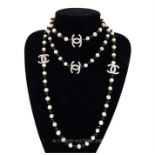 A Chanel style, long, white pearl and black agate beaded necklace