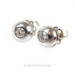 A pair of 18 ct white gold, spherical stud, diamond earrings
