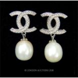 A pair of sterling silver, Chanel-style, white crystal and cultured pearl drop earrings